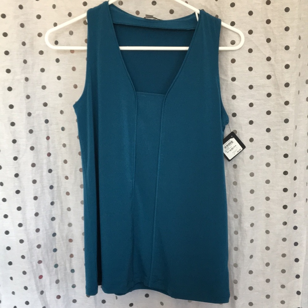 Comfy top to dress or down!